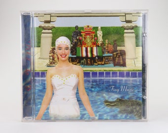 ストーン・テンプル・パイロッツの CD、「タイニー・ミュージック...ソングス・フロム・ザ・バチカン・ギフト・ショップ」(1996)