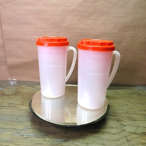 Both 70s TANG Pitchers / Fast, Safe Free Shipping