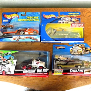 All 4 Vintage Hot Wheels NOS Toys / Transport Truck 1/64 Scale / New Old Stock, New In Package / Fast Safe Free Shipping