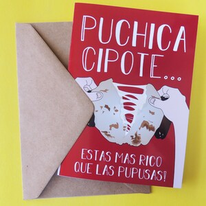 May include: A red card with the text "Puchica Cipote..." and a cartoon illustration of a hand tearing apart a food item. The text at the bottom of the card reads "Estas mas rico que las pupusas!"