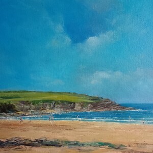 May include: A painting of a beach scene with a blue sky, white clouds, green grass, brown sand, and blue water. There are people in the water and on the beach.