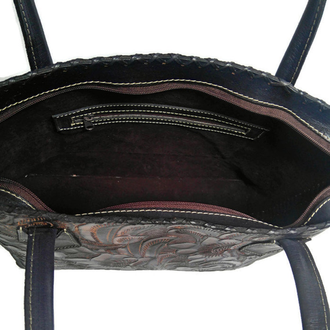 black tooled leather bag
