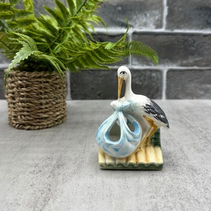 Vintage Porcelain Bisque Stork Figurine; Stork Delivering Baby Figurine; Made in Italy; Cute Stork Baby Boy Blue Blanket Delivery Figurine