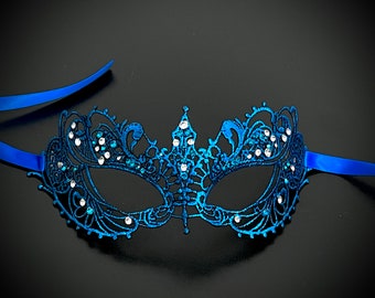 May include: A blue masquerade mask with intricate lace detailing and rhinestones. The mask has a delicate, feminine design and is perfect for a costume party or special occasion.