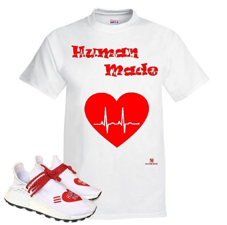 May include: White t-shirt with red text that says "Human Made" and a red heart with a heartbeat graphic. White sneakers with red laces and a red heart with the text "Human Made" on the side.