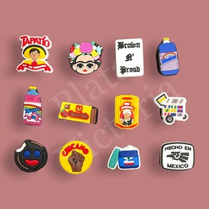 May include: Set of 10 colorful shoe charms featuring various Mexican-themed designs, including a woman with a flower crown, a bottle of Jarritos, a food cart, and a sign that says "Brown & Proud".