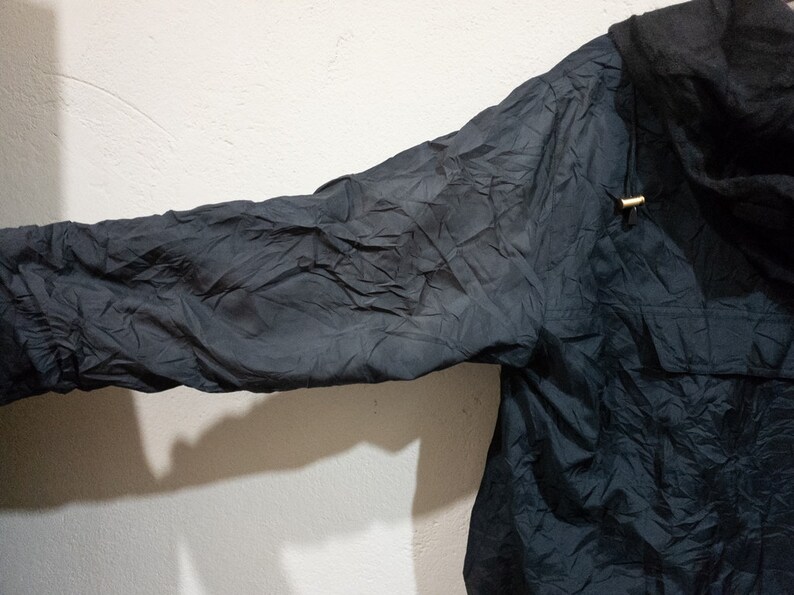 Claudio Valentino Raincoats