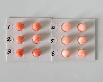 Perline di corallo di acque profonde: rotonde rosa-arancio da 7,5-8 mm - semiforate, colore naturale, coppia per creazione di gioielli