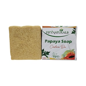 May include: A bar of papaya soap in a white box with green leaves and a papaya fruit. The box says "Fifynaturals Papaya Soap Complexion Bar 100% Natural Vegan".