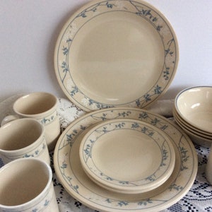 Nice set of Corelle in the First of Spring Pattern ( 20 piece set )