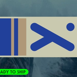 May include: A rectangular sticker with a light beige background. The left side features vertical stripes in blue and tan. The right side has a blue geometric design and a blue dot. The words "READY TO SHIP" are in green.