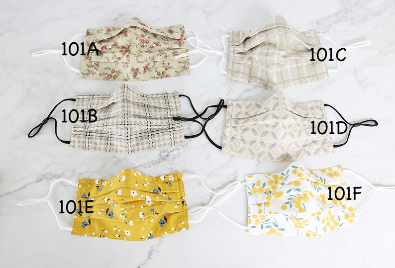 May include: Six different fabric face masks with various patterns. The masks are labeled 101A, 101B, 101C, 101D, 101E, and 101F.