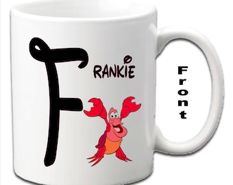 Tazas blancas personalizadas con la inicial SEBASTIAN ~ Personaje de La Sirenita