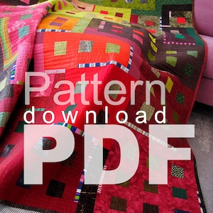May include: A colorful quilt with a patchwork design in shades of red, green, brown, and orange. The quilt is folded and draped over a couch. The text "Pattern download PDF" is printed in white on the quilt.