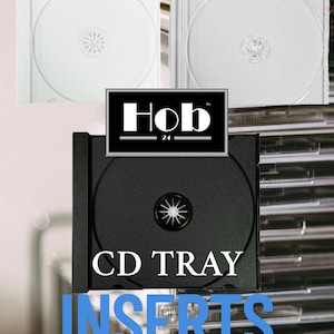 May include: A close-up of black CD tray inserts with the text "CD TRAY INSERTS" and the logo "Hob 24" in white. The inserts are stacked on top of each other.