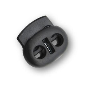 Puede incluir: Toggle de plástico negro con dos agujeros para cordón o cuerda. El toggle tiene un mecanismo de resorte para asegurar el cordón.