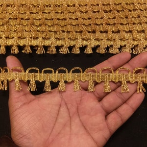 Indian Metallic Gold Woven Tassel Fringe Gold Border Ribbon Lace Trim For Embellishment Border For Crafting, Sewing And Cloth Accessories.