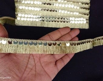 Borlas de encaje con flecos en beige metalizado: borde con adorno indio