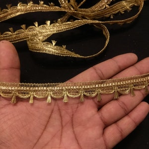 Indian Metallic Beige Gold Indian hand work Tassels Fringe Lace Trim With Embellishment Border For Crafting, Sewing And Cloth Accessories.