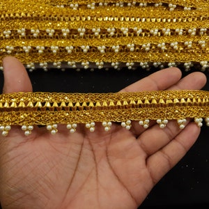 This is Indian Gold and white Beaded Fringe Lace Trim With Hand Work For Decoration