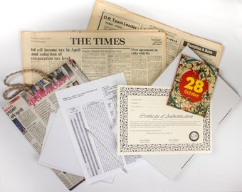 Genuine Newspaper From The Day You Were Born or Anniversary. This Gift Set Includes a Free Birthday Book and Certificate of Authenticity