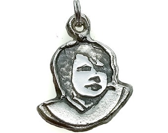 Willie Charm  . Sterling Silver