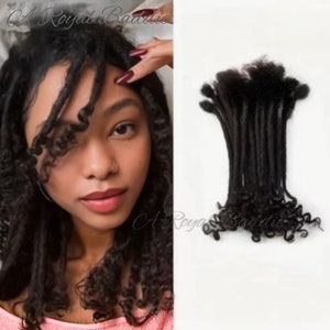 May include: A set of 12 black curly dreadlocks hair extensions. The dreadlocks are about 12 inches long and have a natural, curly texture.