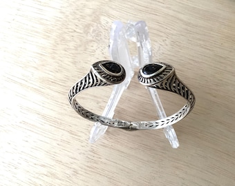 Sterling ornate 7 inch hinged cuff bracelet with dark bronze tear drop gemstone.   REF 3129
