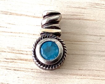 Sterling and 14kt gold pendant with blue gemstone. REF 3133-B