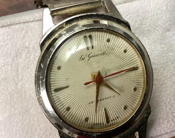 Vintage Les Genevez non working watch sold as is for parts or repair. Ref AM33