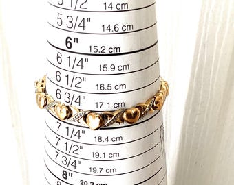 Vermeil over Sterling hearts and kisses 7 inch bracelet.  REF3138