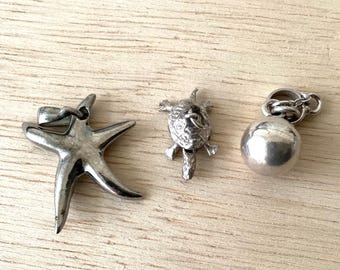 1 lot of 3 Sterling pendants. REF3133-3