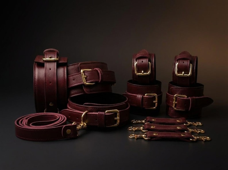 Luxury burgundy leather BDSM bondage set gift box with cuffs, collar, spread bar and connectors, premium handmade bondage kit for couples anniversary or wedding gift.