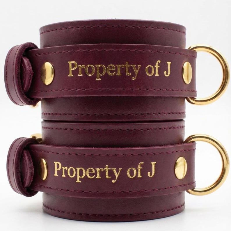 Personalized leather cuffs engraved Property of J, custom BDSM restraints with gold lettering romantic personalized couple gift.