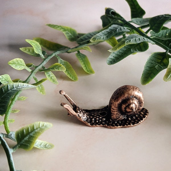 Tiny copper snail incense holder