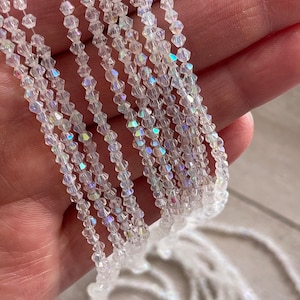 Iridescent crystal bead, crystal beads on 49 cm thread, 3 mm bicone beads