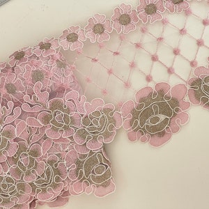 Embroidered lace on pink tulle, pink lace with pink and gold flower pattern,