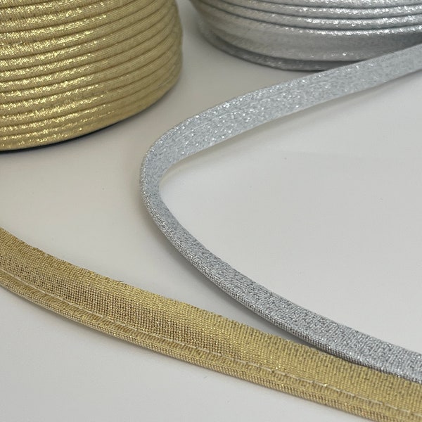 Vorstehendes Paspelband aus metallisch grauem Lurex, Gold- und Gold-Lurex-Paspel, 13 mm breit