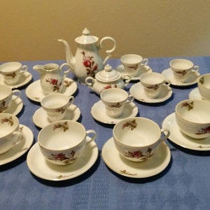 30 piece set of vintage Rose Moss tea service. Fairyland Imports, Japan. Complete set and Absolutely beautiful! They were my grandmother's.