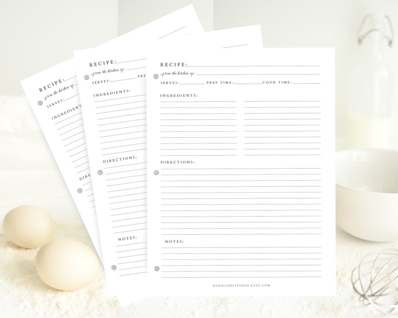 May include: Three blank recipe cards with lined spaces for writing down ingredients, directions, and notes. The cards have a simple design with a gray circle and text that says "RECIPE: from the kitchen of..."