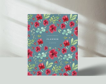 Undated weekly planner binder with dark floral cover design