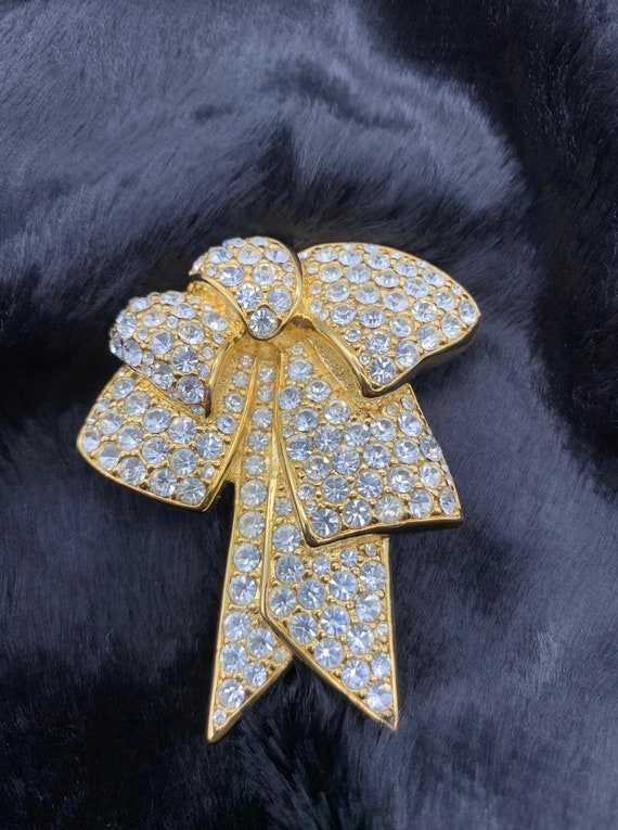 Nolan Miller Ribbon Bow Rhinestone and Gold Brooch