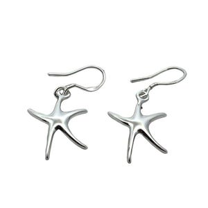 May include: A pair of silver starfish dangle earrings with a simple design. The earrings have a hook fastening.