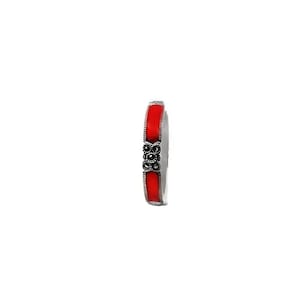 May include: A silver ring with a red enamel band and a black marcasite flower design.