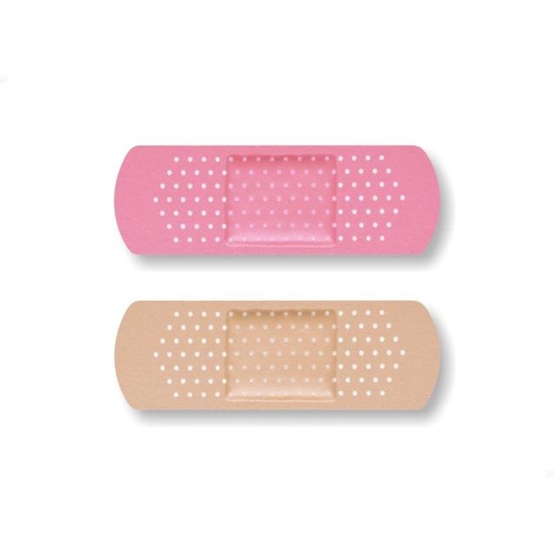 May include: Two adhesive bandages, one pink and one beige, with white polka dots.