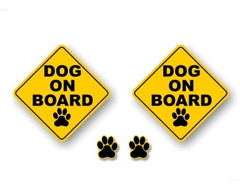 May include: Two yellow diamond-shaped signs with black text that reads "DOG ON BOARD" and a black paw print. Two black paw prints are below the signs.