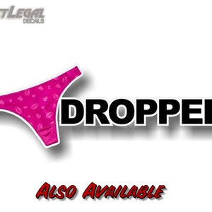 May include: Pink underwear with a heart and lip print design, with the word "DROPPER" in black text above it. The text "ALSO AVAILABLE" is in red text below the underwear.
