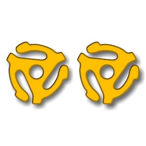 May include: Two yellow vinyl record adapter spindle labels. The labels are shaped like a three-pronged adapter.