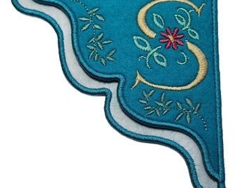 Handmade Personalized Embroidered corner bookmark with Antique Cosmo monogram on Teal felt.