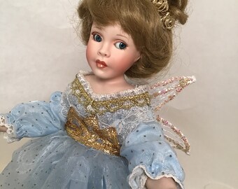 porcelain dolls with angel wings